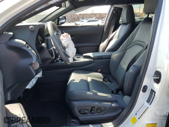 2024 Lexus UX with VIN JTHX6JBH7R2189588, listed as a Copart auction lot 70237664 with 9,963 mi miles and Salvage Title. Bid and sale history available at carsss.com. Image 7.