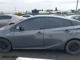 2019 Toyota Prius L Eco with VIN JTDKARFU3K3099256, listed as a IAAI auction lot 41813619 with 169,900 mi miles. Bid and sale history available at carsss.com. Image 14.