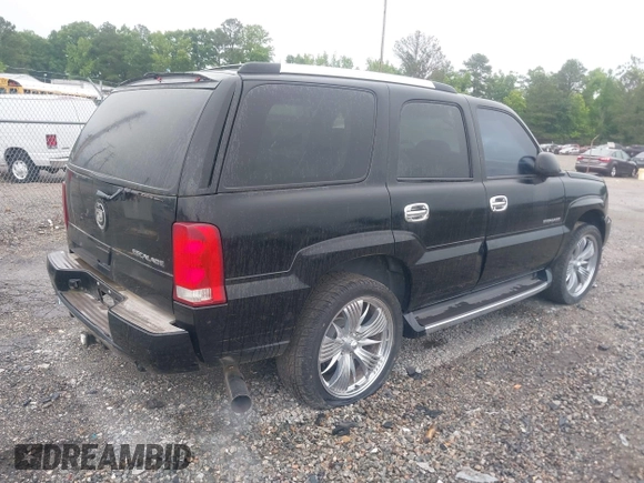 2003 Cadillac Escalade z VIN 1GYEK63N13R140496, wystawiony jako IAAI lot #42366303 z przebiegiem 90 940 mil mil oraz . Historia ofert i sprzedaży dostępna na DreamBid. Obrazek 4.