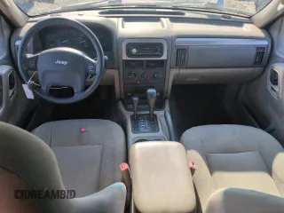 2004 Jeep Grand Cherokee Laredo with VIN 1J4GW48S54C363256, listed as a Copart auction lot 61862615 with 163,721 mi miles and Salvage title. Bid and sale history available at DreamBid. Image 8.