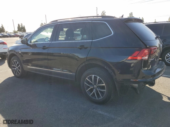 2020 Volkswagen Tiguan SE with VIN 3VV3B7AX2LM105721, listed as a Copart auction lot 79272814 with 59,887 mi miles and Salvage Title. Bid and sale history available at carsss.com. Image 2.