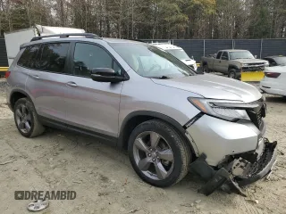 2020 Honda Passport Touring with VIN 5FNYF8H96LB004076, listed as a Copart auction lot 81239214 with 55,787 mi miles and Salvage title. Bid and sale history available at DreamBid. Image 4.