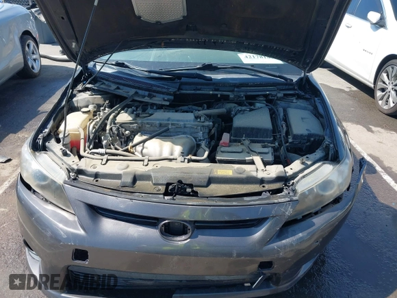 2011 Scion tC z VIN JTKJF5C75B3011644, wystawiony jako IAAI lot #42178185 z przebiegiem 108 187 mil mil oraz . Historia ofert i sprzedaży dostępna na DreamBid. Obrazek 10.