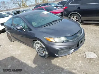 2015 Honda Civic Coupe LX with VIN 2HGFG3B52FH533828, listed as a IAAI auction lot 41725138 with 101,892 mi miles. Bid and sale history available at carsss.com. Image 1.