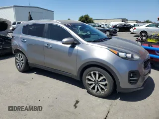 2017 Kia Sportage EX with VIN KNDPN3AC9H7101499, listed as a Copart auction lot 60712175 with 103,279 mi miles and Salvage title. Bid and sale history available at DreamBid. Image 4.