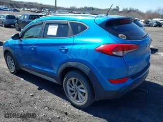 2017 Hyundai Tucson SE Plus with VIN KM8J3CA4XHU315340, listed as a IAAI auction lot 41857937 with 83,957 mi miles. Bid and sale history available at carsss.com. Image 3.
