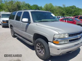 2004 Chevrolet Suburban Z71 z VIN 3GNFK16Z14G122679, wystawiony jako IAAI lot #41979958 z przebiegiem 238 912 mil mil oraz . Historia ofert i sprzedaży dostępna na DreamBid. Obrazek 1.