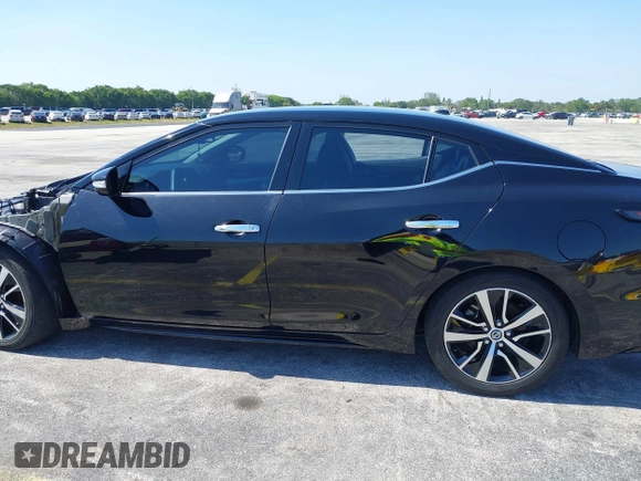2021 Nissan Maxima SV with VIN 1N4AA6CV4MC506744, listed as a IAAI auction lot 42150465 with 70,056 mi miles and . Bid and sale history available at DreamBid. Image 14.