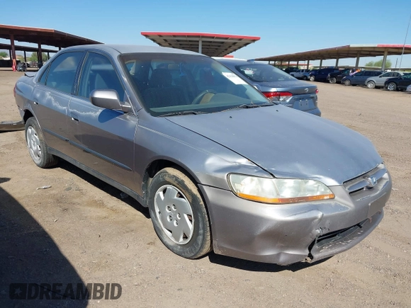 2000 Honda Accord LX z VIN 1HGCG1645YA021815, wystawiony jako IAAI lot #42438876 z przebiegiem 219 687 mil mil oraz . Historia ofert i sprzedaży dostępna na DreamBid. Obrazek 1.