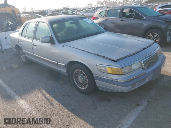 1994 Mercury Grand Marquis LS z VIN 2MELM75W9RX669484, wystawiony jako IAAI lot #41838499 z przebiegiem 101 777 mil mil oraz . Historia ofert i sprzedaży dostępna na DreamBid. Obrazek 1.