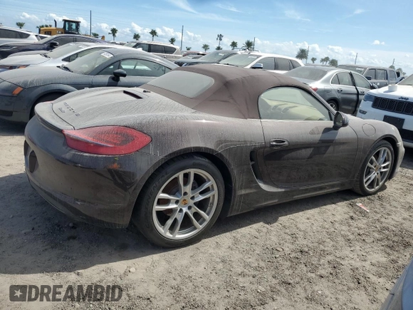 2014 Porsche Boxster с VIN WP0CA2A83ES120462, выставлен на аукционе Copart как лот 74617404 с пробегом 23 055 миль миль и На запчасти • Non repairable. История ставок и продаж доступна на DreamBid. Изображение 3.