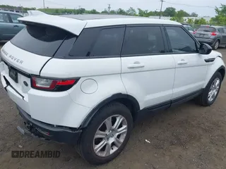 2016 Land Rover Range Rover Evoque SE z VIN SALVP2BG2GH085063, wystawiony jako IAAI lot #42337615 z przebiegiem 99 391 mil mil oraz . Historia ofert i sprzedaży dostępna na DreamBid. Obrazek 4.