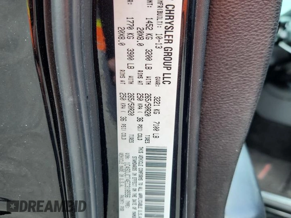 2014 Dodge Durango R/T z VIN 1C4SDJCT4EC318556, wystawiony jako Copart lot #60149025 z przebiegiem 184 114 mil mil oraz Szkoda całkowita • Salvage title. Historia ofert i sprzedaży dostępna na DreamBid. Obrazek 13.