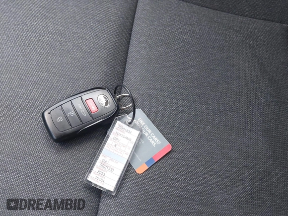 2025 Toyota Camry LE with VIN 4T1DAACKXSU541257, listed as a IAAI auction lot 42052246 with 13,585 mi miles and . Bid and sale history available at DreamBid. Image 11.