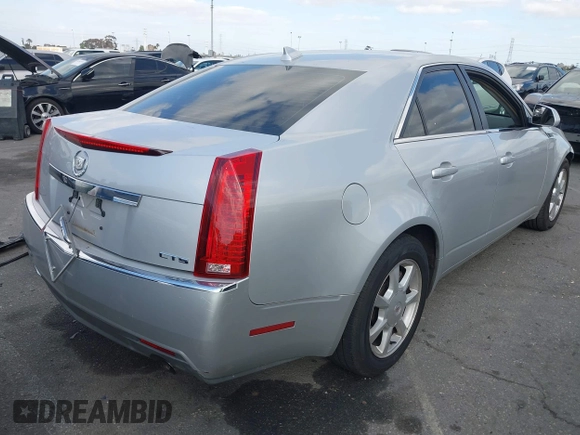 2009 Cadillac CTS RWD w/1SA with VIN 1G6DJ577690159748, listed as a IAAI auction lot 41544651 with 100,931 mi miles. Bid and sale history available at carsss.com. Image 4.