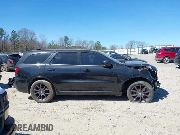 2015 Dodge Durango R/T with VIN 1C4SDHCT2FC222659, listed as a IAAI auction lot 41606664 with 122,321 mi miles and . Bid and sale history available at DreamBid. Image 13.