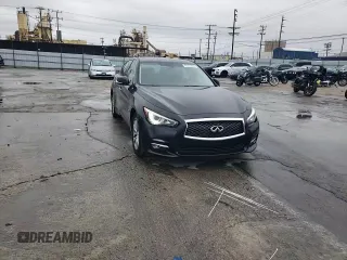2017 Infiniti Q50 Premium z VIN JN1EV7AP6HM733365, wystawiony jako Copart lot #47551995 z przebiegiem 103 669 mil mil oraz Szkody całkowita. Historia ofert i sprzedaży dostępna na DreamBid. Obrazek 11.