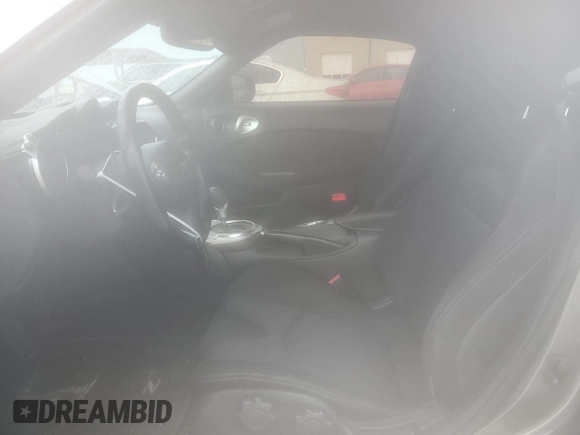 2015 Nissan 370Z Nismo z VIN JN1AZ4EH0FM444256, wystawiony jako Copart lot #54620065 z przebiegiem 78 626 mil mil oraz Szkoda całkowita • Salvage title. Historia ofert i sprzedaży dostępna na DreamBid. Obrazek 7.