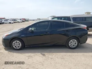 2016 Toyota Prius Two z VIN JTDKBRFU4G3509129, wystawiony jako IAAI lot #42321562 z przebiegiem 246 582 mil mil oraz . Historia ofert i sprzedaży dostępna na DreamBid. Obrazek 14.