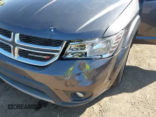 2014 Dodge Journey SXT with VIN 3C4PDCBG6ET192288, listed as a IAAI auction lot 41787594 with 132,973 mi miles. Bid and sale history available at carsss.com. Image 6.