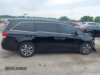 2015 Honda Odyssey Touring Elite with VIN 5FNRL5H97FB124565, listed as a IAAI auction lot 42358412 with 206,444 mi miles and . Bid and sale history available at DreamBid. Image 14.