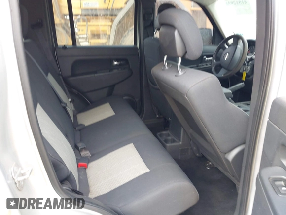 2010 Jeep Liberty Sport with VIN 1J4PN2GK1AW142692, listed as a IAAI auction lot 41512931 with 146,349 mi miles. Bid and sale history available at carsss.com. Image 8.