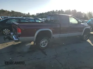 2000 Dodge Dakota SLT with VIN 1B7GG22X7YS639007, listed as a Copart auction lot 84829204 with 148,408 mi miles and Salvage Title. Bid and sale history available at DreamBid. Image 3.