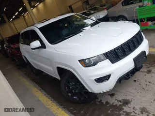 2019 Jeep Grand Cherokee Laredo E with VIN 1C4RJFAG1KC818289, listed as a IAAI auction lot 41602541 with 59,356 mi miles. Bid and sale history available at carsss.com. Image 1.