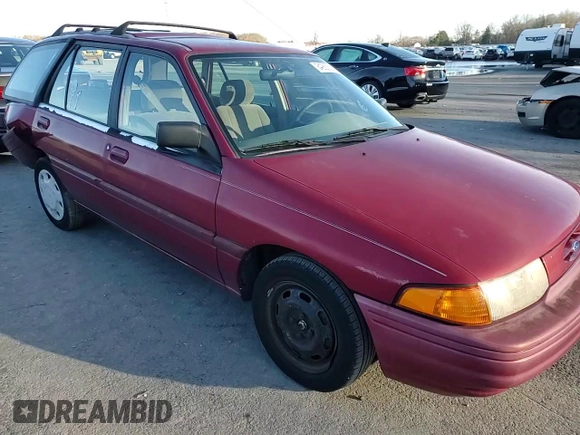 1996 Ford Escort z VIN 1FASP15J7TW112703, wystawiony jako Copart lot #84905564 z przebiegiem 119 575 mil mil oraz Szkoda całkowita • Salvage title. Historia ofert i sprzedaży dostępna na DreamBid. Obrazek 11.
