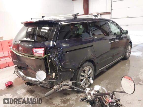 2018 Kia Sedona SX-L with VIN KNDME5C15J6396705, listed as a IAAI auction lot 41500453 with 102,636 mi miles. Bid and sale history available at carsss.com. Image 4.