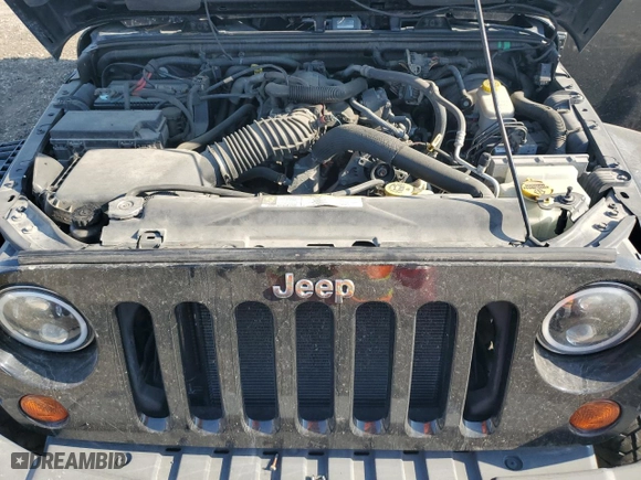 2011 Jeep Wrangler Unlimited Sahara with VIN 1J4BA5H10BL634002, listed as a Copart auction lot 75035234 with 139,182 mi miles and Salvage Title. Bid and sale history available at carsss.com. Image 11.