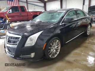 2014 Cadillac XTS Platinum with VIN 2G61W5S83E9144175, listed as a Copart auction lot 43064435 with 140,905 mi miles and Salvage Title. Bid and sale history available at DreamBid. Image 1.