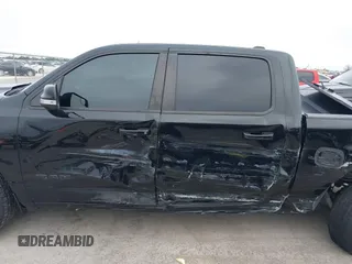 2019 Ram 1500 Big Horn z VIN 1C6RREFT1KN891182, wystawiony jako IAAI lot #41634042 z przebiegiem 128 972 mil mil oraz . Historia ofert i sprzedaży dostępna na DreamBid. Obrazek 6.