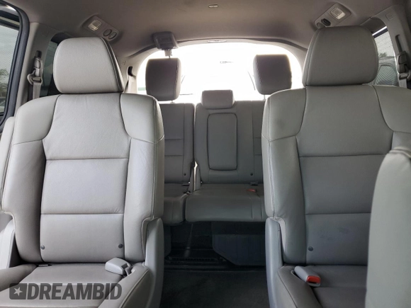 2014 Honda Odyssey Touring with VIN 5FNRL5H93EB034263, listed as a Copart auction lot 57254485 with 150,084 mi miles and Salvage title. Bid and sale history available at DreamBid. Image 10.