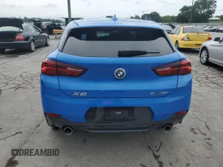 2023 BMW X2 sDrive28i with VIN WBXYH9C08P5V32303, listed as a Copart auction lot 64951994 with 22,462 mi miles and Salvage Title. Bid and sale history available at carsss.com. Image 6.