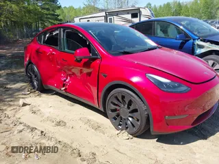 2022 Tesla Model Y Performance with VIN 7SAYGDEFXNF513951, listed as a IAAI auction lot 41986001 with 37,225 mi miles and . Bid and sale history available at DreamBid. Image 6.