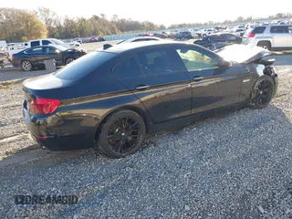2014 BMW 5 Series 535i xDrive with VIN WBA5B3C51ED532766, listed as a IAAI auction lot 41368436 with Not Provided miles and . Bid and sale history available at carsss.com. Image 4.