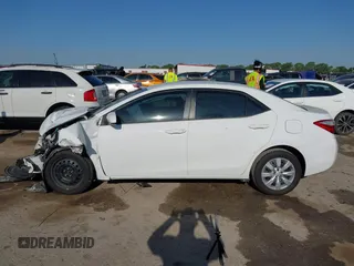 2015 Toyota Corolla L z VIN 2T1BURHE3FC392777, wystawiony jako IAAI lot #42024458 z przebiegiem 99 051 mil mil oraz . Historia ofert i sprzedaży dostępna na DreamBid. Obrazek 14.