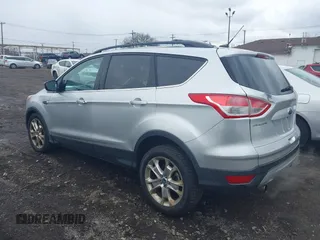 2013 Ford Escape SE with VIN 1FMCU0GX5DUA51847, listed as a IAAI auction lot 41897727 with 115,721 mi miles and . Bid and sale history available at DreamBid. Image 3.