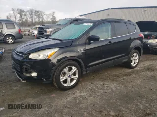 2014 Ford Escape SE with VIN 1FMCU9GX2EUC86115, listed as a Copart auction lot 82810324 with 212,346 mi miles and Salvage Title. Bid and sale history available at DreamBid. Image 1.