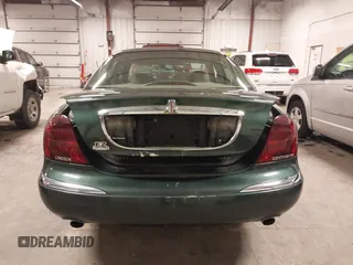 2001 Lincoln Continental with VIN 1LNHM97V11Y691910, listed as a IAAI auction lot 41501779 with 102,715 mi miles. Bid and sale history available at carsss.com. Image 16.