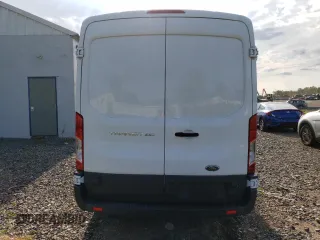 2016 Ford Transit Cargo with VIN 1FTYR2CM1GKA95802, listed as a Copart auction lot 67129054 with 69,590 mi miles and Salvage Title. Bid and sale history available at DreamBid. Image 6.