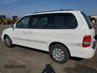 2005 Kia Sedona LX with VIN KNDUP132056685525, listed as a Copart auction lot 77790354 with 60,985 mi miles and Salvage Title. Bid and sale history available at carsss.com. Image 2.