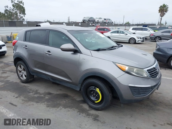 2013 Kia Sportage LX with VIN KNDPBCA23D7529658, listed as a IAAI auction lot 42473877 with 114,797 mi miles and . Bid and sale history available at DreamBid. Image 1.