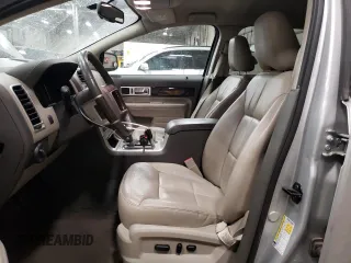 2009 Lincoln MKX with VIN 2LMDU68C69BJ09162, listed as a Copart auction lot 89259625 with 124,908 mi miles and Salvage Title. Bid and sale history available at DreamBid. Image 7.