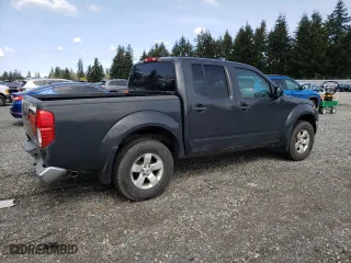2011 Nissan Frontier PRO-4X with VIN 1N6AD0EV4BC426088, listed as a Copart auction lot 52604935 with 179,848 mi miles and Salvage Title. Bid and sale history available at carsss.com. Image 3.