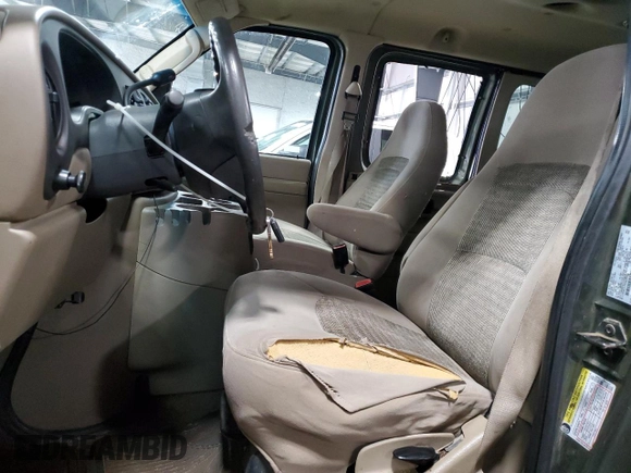 2005 Ford Econoline Passenger XL with VIN 1FBNE31L75HB26371, listed as a Copart auction lot 53566155 with 219,769 mi miles and Clean Title. Bid and sale history available at carsss.com. Image 7.