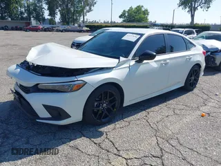 2024 Honda Civic Sport z VIN 2HGFE2F59RH554741, wystawiony jako IAAI lot #42297894 z przebiegiem 10 701 mil mil oraz . Historia ofert i sprzedaży dostępna na DreamBid. Obrazek 17.