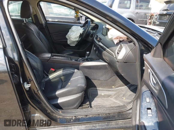 2018 Mazda 3 Touring with VIN 3MZBN1V34JM261565, listed as a IAAI auction lot 41795238 with 121,112 mi miles. Bid and sale history available at carsss.com. Image 5.