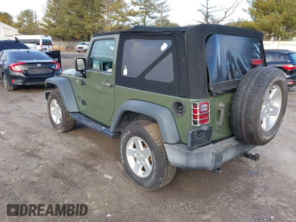 2016 Jeep Wrangler Sport with VIN 1C4AJWAG7GL330159, listed as a IAAI auction lot 41530415 with 98,554 mi miles and . Bid and sale history available at carsss.com. Image 3.